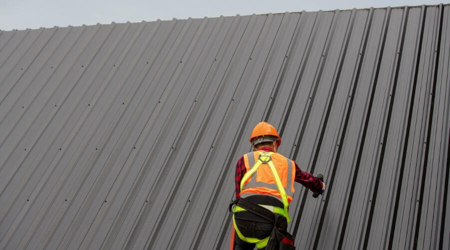 Professional metal roof installation services in Harlan, IA